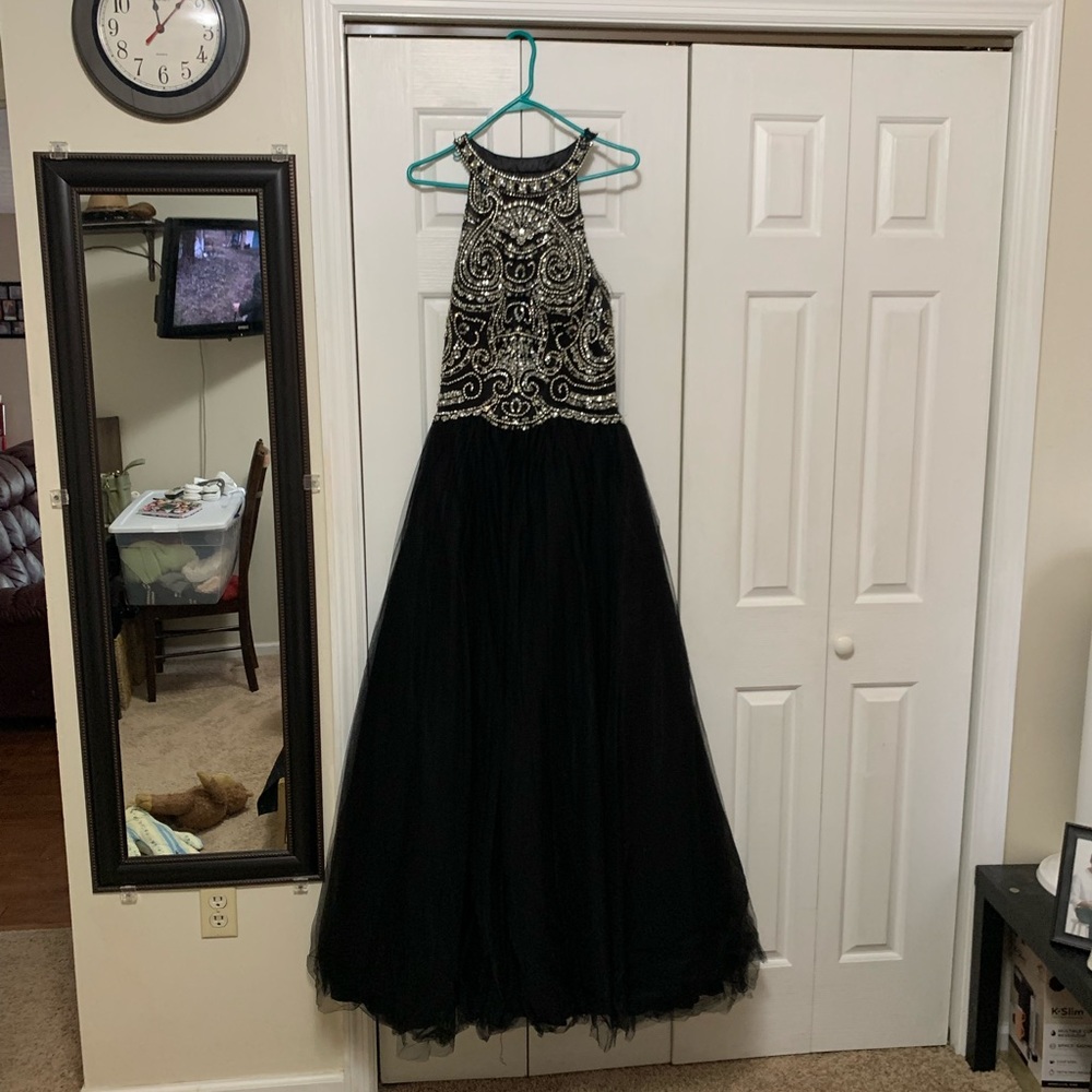 Formal dress from Geno’s formal affairs
